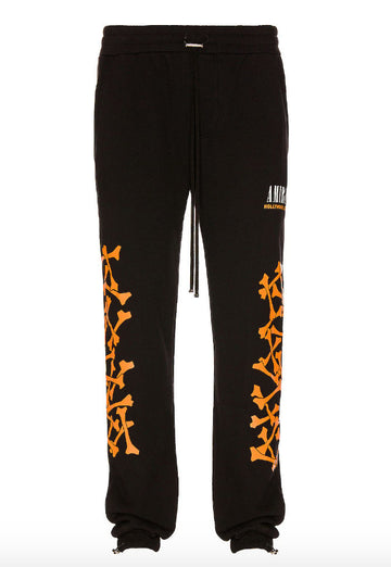 Amiri Stack Bone Orange Sweatpants